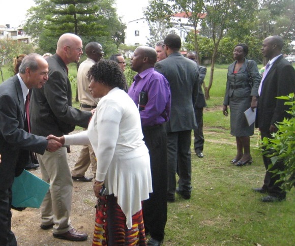 Delegates from Denver Sister Cities International meet with Headmistress Jane (in white) of Madaraka Primary School and other staff